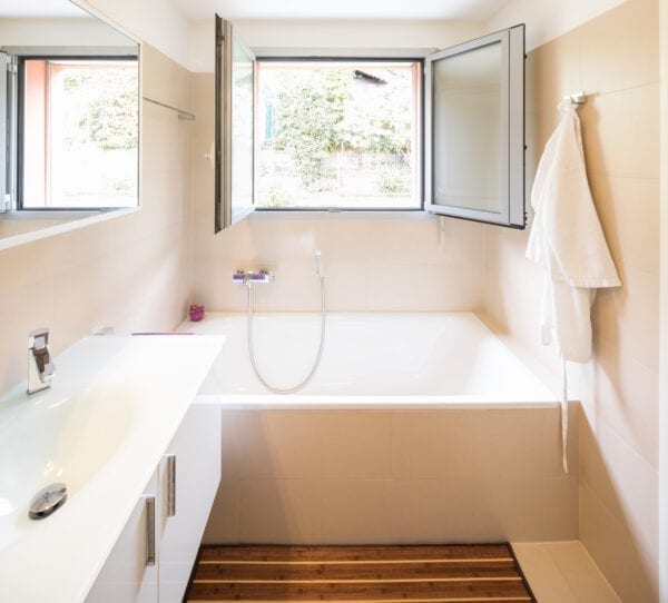 Elegant bathroom with large sink and mirror. Nobody inside