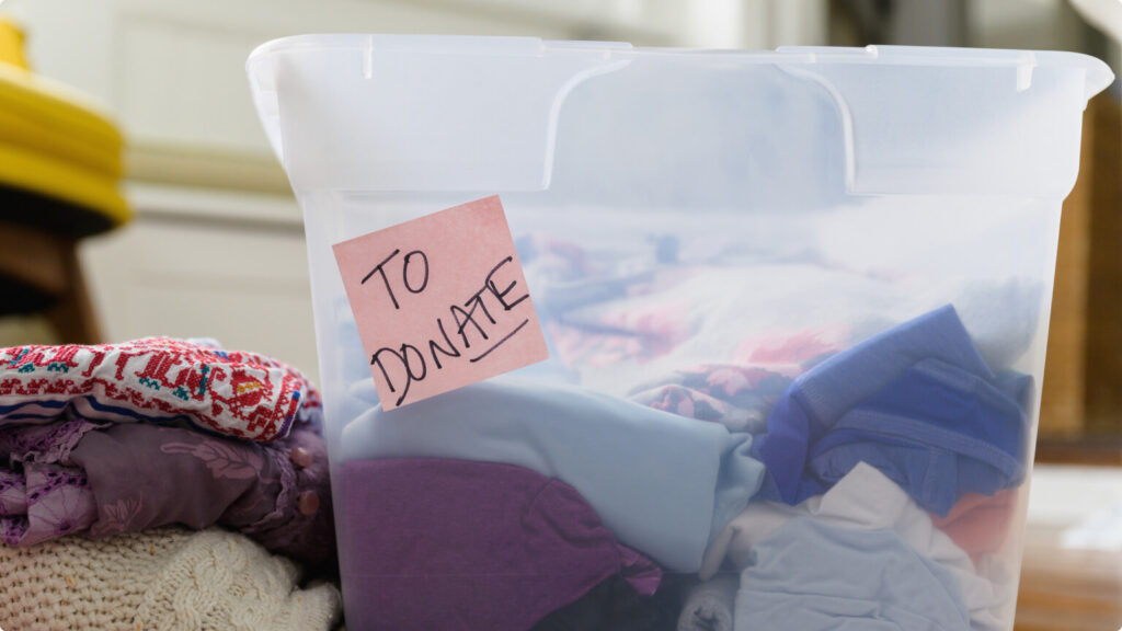 Clothes in bin marked for donation