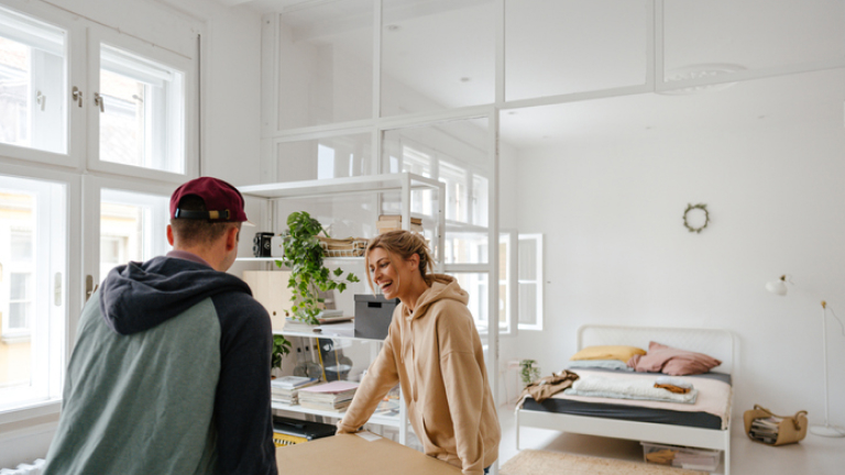 Young couple moving into a new apartment