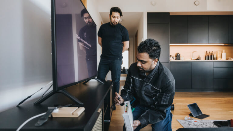 IT technician installing wifi router