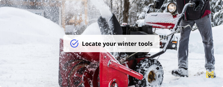 Senior Man Using SnowBlower After a Snowstorm